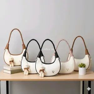 NAURA Tas Selempang Wanita Tali Kepang Free Gantungan Boneka Desain Elegan dan Praktis untuk Gaya Harian Anda