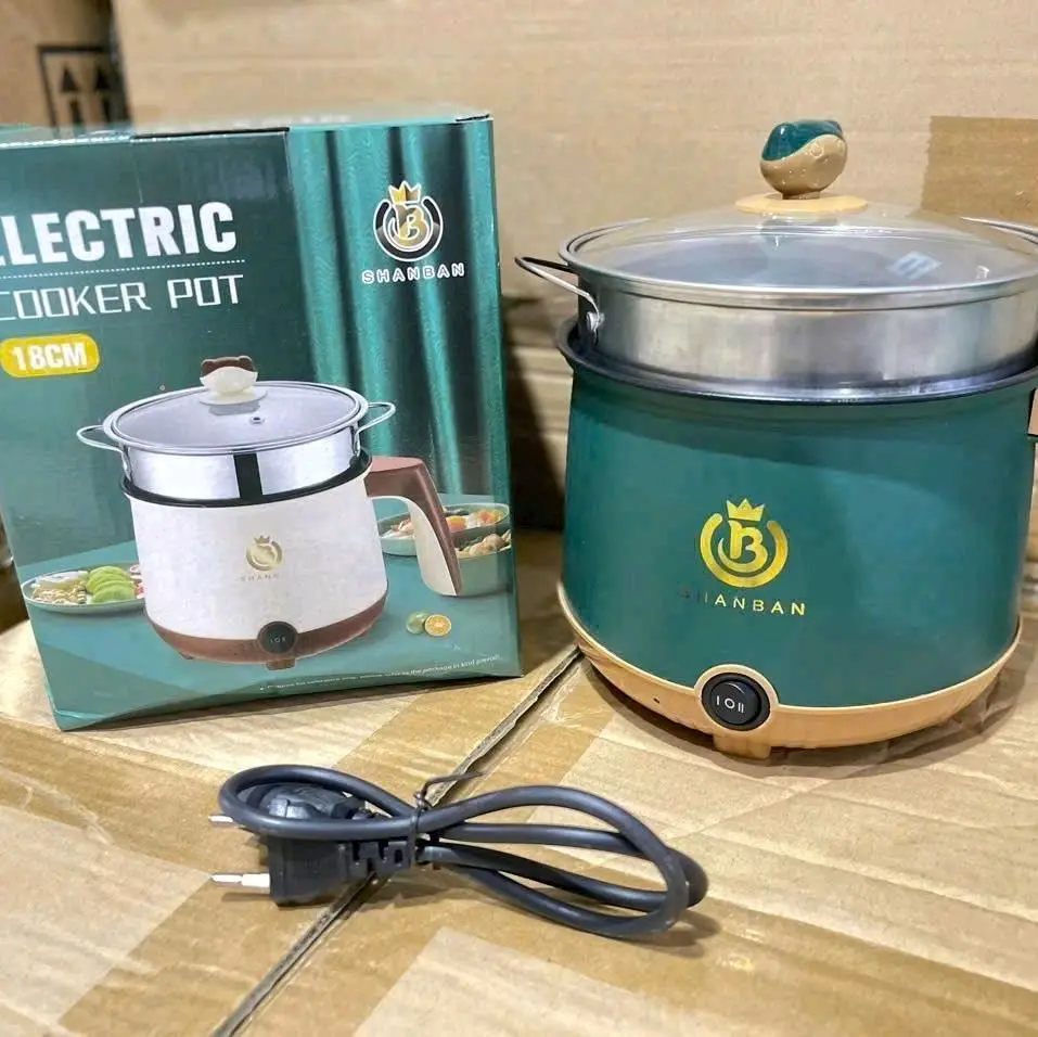 Nồi lẩu điện mini dra năng 18CM SHANBAN kèm lồng hấp INOX  Lòng nồi chống dính cao cấp nên có thể dùng để chiên xào thịt, trứng...mà không lo bị dính đáy nồi Ngoài ra còn dùng để nấu canh, hầm, luộc, lẩu...trên 1 chiếc nồi bé nhỏ này quá tiện lợi