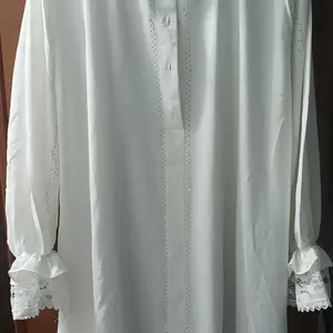 Nisyaa Abaya Renda Premium – Elegan Kancing Depan motif marmer