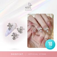 Gambar 10 Pcs Hiasan Kuku Pita Logam Silver Berlian Busur Liontin Tetesan Air Aksesoris Nail Art - Pita dari Shinycat Kota Tangerang 1 Tokopedia