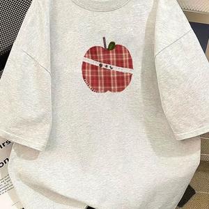 クリエイティブトレンドアップル柄プリント婦人用半袖Tシャツ、ラウンドネック、ゆったり、純綿カジュアルトップス、ラウンドネック、ショルダーベルト、ゆったりシルエット、通気性、肩落ちデザインプリントTシャツ夏のゆったりタイプ