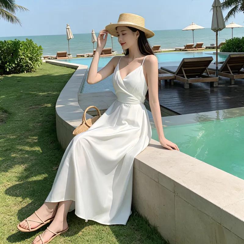 Đầm dây kiểu Pháp cổ điển mùa hè 2026, đầm maxi hở lưng màu trơn siêu thanh lịch, phong cách đi biển, đầm nữ đi nghỉ dưỡng.váy 2dây