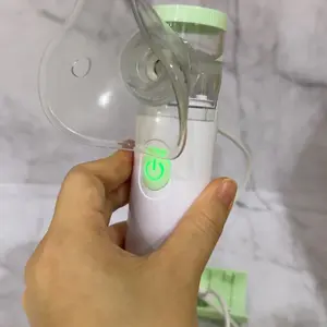 Handheld nebulizer alat bantu pernafasan portable dewasa dan anak
