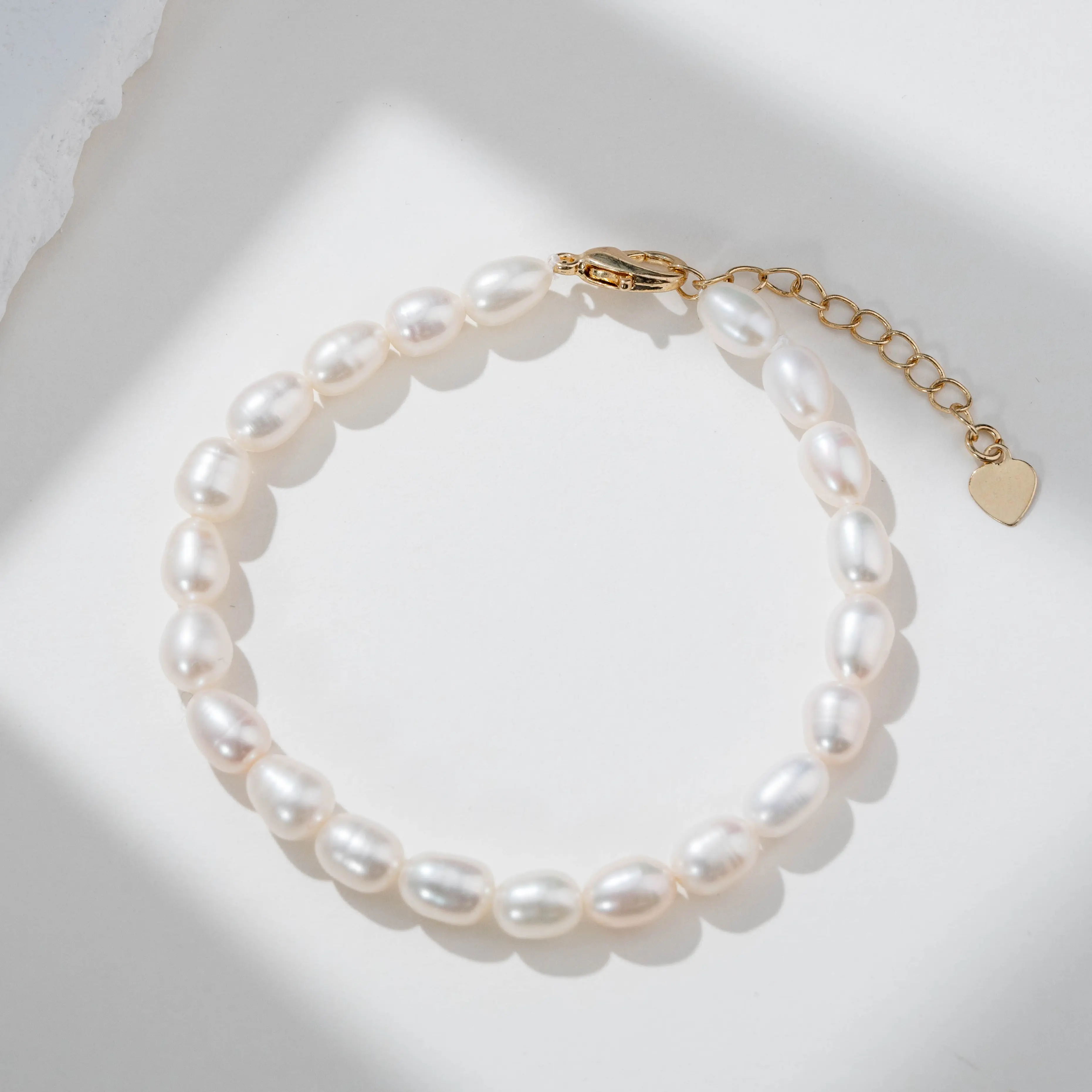 Alloy fresh water coreless rice white Pearl bracelet 5.5-6.5mm rice microconcealer ZH12591
