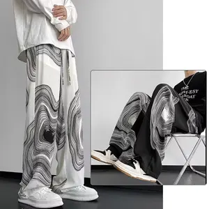 Produk baru 2025 Sweet spants baggy Celana y2k Celana pria korean style Tidak memudar Pusaran Sweatpants loose Celana casual pria Longgar dan modis Lembut dan nyaman  Katun