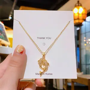 Kalung Liontin Sepasang Lumba-Lumba Kristal Simbol Cinta & Harmoni  Kalung Liontin Dua Ikan Emas