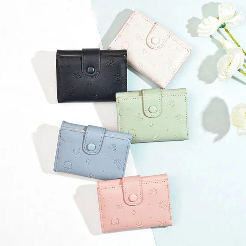 DW-27 Dompet lipat Wanita Mini Motif Embos 0