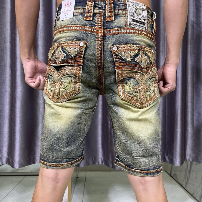 Quần short Jean nam 2 màu xanh rêu chỉ cam và xanh bạc chỉ xanh. Túi thêu đắp da chỉ độ 4 kim