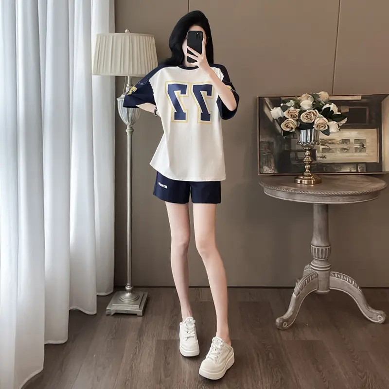 Women's summer design niche color blocking splicing short sleeved shorts two-piece set