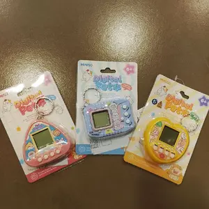 MINISO Digital Pet 6+ Mainan Edukatif untuk Anak-anak dengan Desain Lucu dan Fungsi Interaktif dalam Warna Ceria
