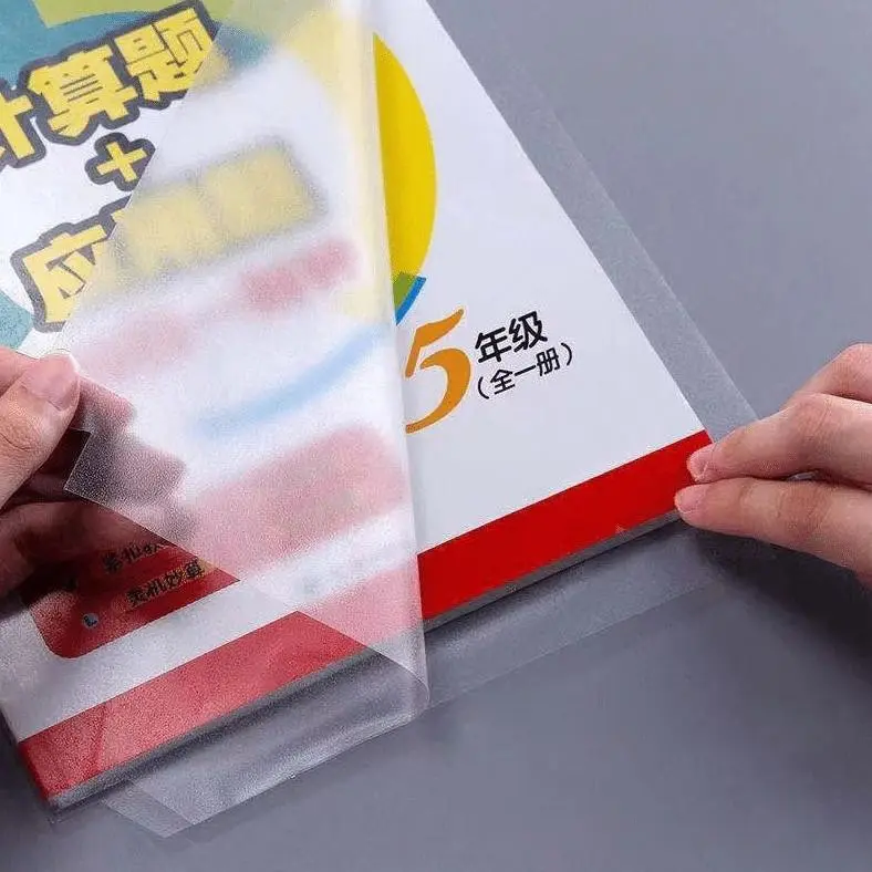 10 Lembar Sampul Buku Plastik PVC Tahan Air Sampul Plastik Lks Film Pelindung Buku Tulis Paper Stationery 7