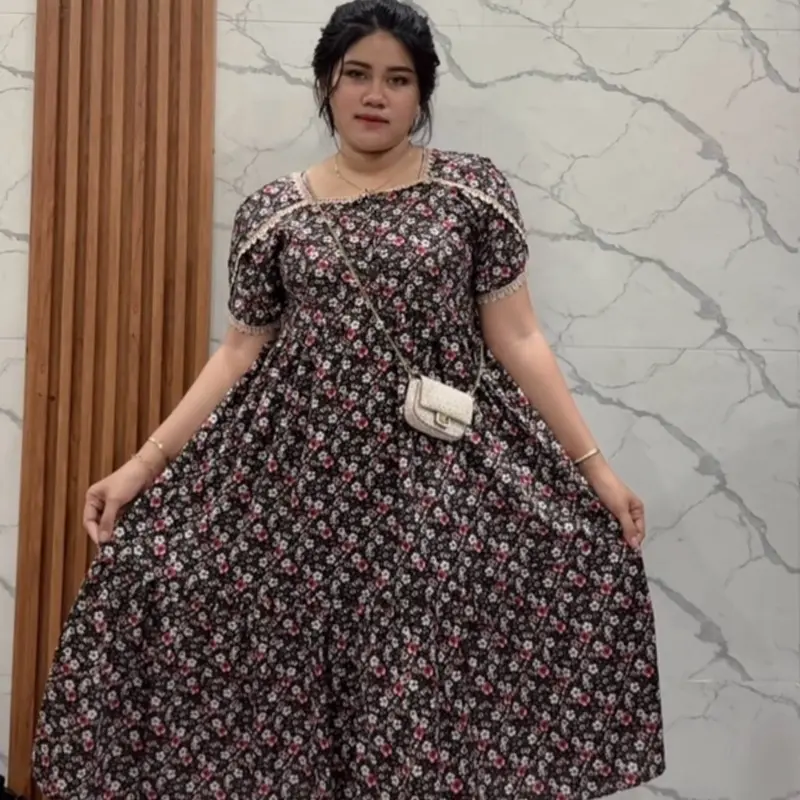 Daster motif bunga kancing bahan rayon 1