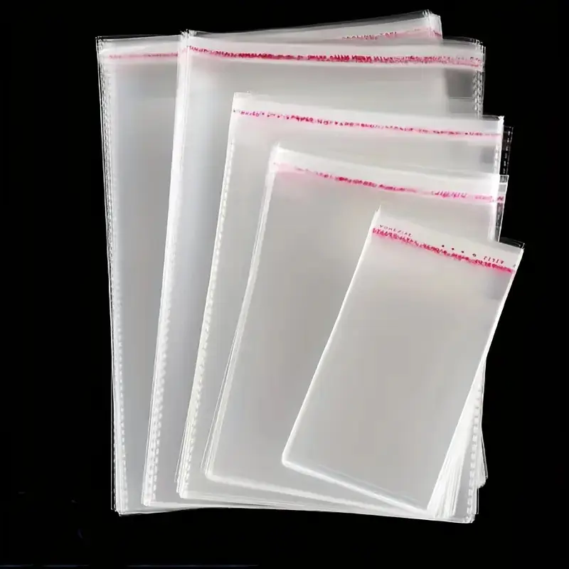 100 Pack Clear Polyethylene T-Shirt Bags Self-Adhesive Cellophane Bags - Versatile Plastic Packaging for Clothing, Decor, Gifts, and Artworks - Resealable Transparent Apparel Pouches