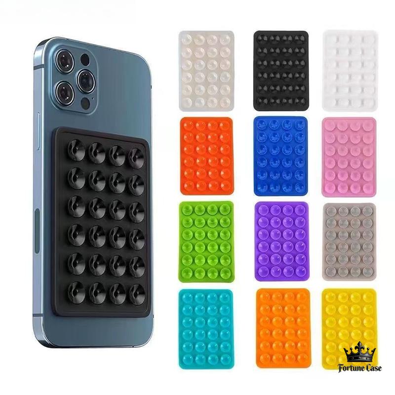 Miếng Dán Hút Chân Không Bằng Silicone Hình Bạch Tuộc, Làm Từ Chất Liệu Silicone Dẻo Dai Và Đàn Hồi Cao, Có Thể Bám Trực Tiếp Vào Mặt Sau Điện Thoại / Ốp Lưng Điện Thoại Mà Không Cần Keo Dán, Có Thể Giặt Nhiều Lần Và Tái Sử Dụng, Có Nhiều Màu Để Lựa Chọn.