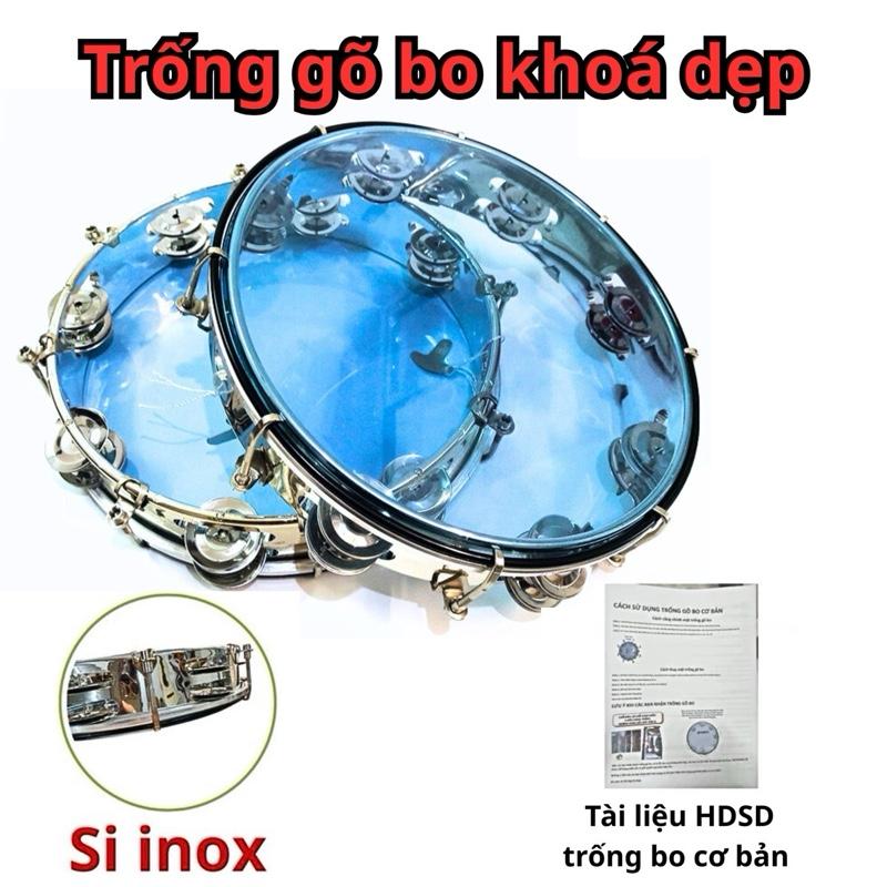  Trống gõ bo nhựa xi khoá dẹp có viền đen bảo vệ 27cm tambourine trống lục lạc lắc tay . Tặng kèm khoá chỉnh và tài liệu hướng dẫn sử dụng trong go gõ nhạc 