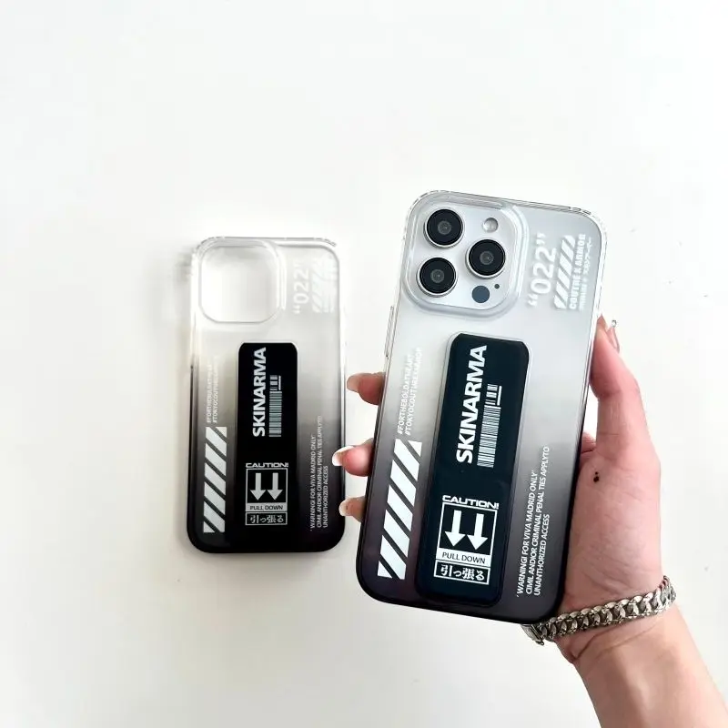 ST- CASE SKINARMA STAND HOLDER FOR IPHONE 11 / 11 PRO / 11 PRO MAX  / 12/12 PRO. / 12 PRO MAX / 13 / 13 PRO / 13 PRO MAX / 14 / 14 PRO. / 14 PRO MAX / 15 / 15 PRO / 15 PRO MAX