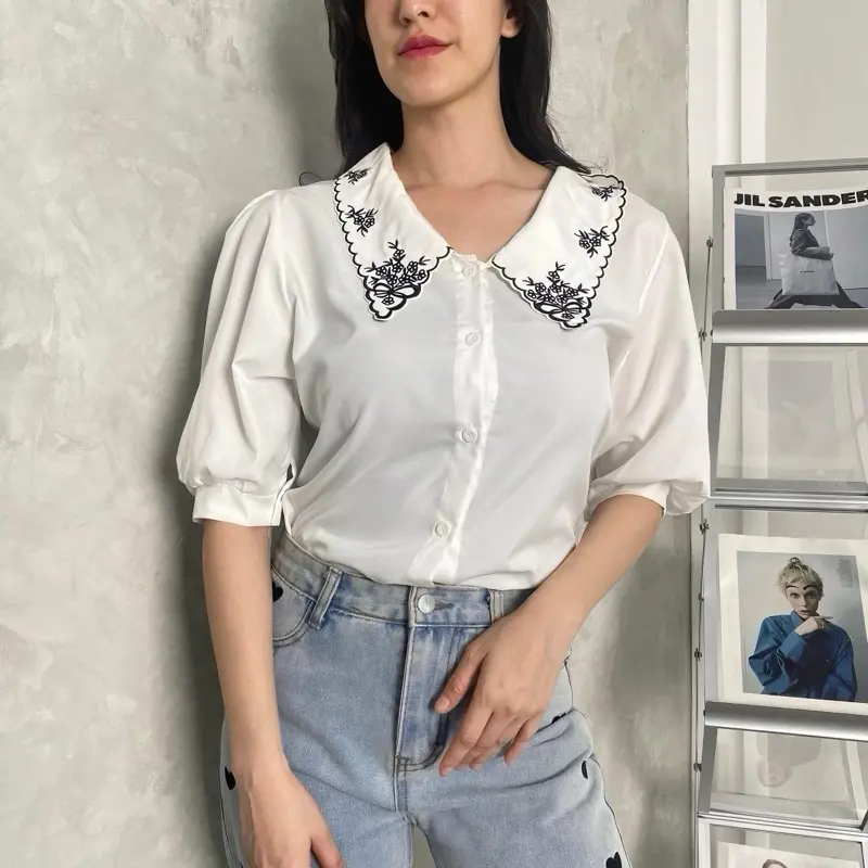 Hikari Top (Best Selling Top DearSista) Atasan Wanita Korean Style Hitam Stylish Kekinian Imut Lengan Pendek Baju Bordir Casual Kancing Street Style White Katun Kerah Nyaman Panjang Polyester Putih High Simple Cantik Tangan 7