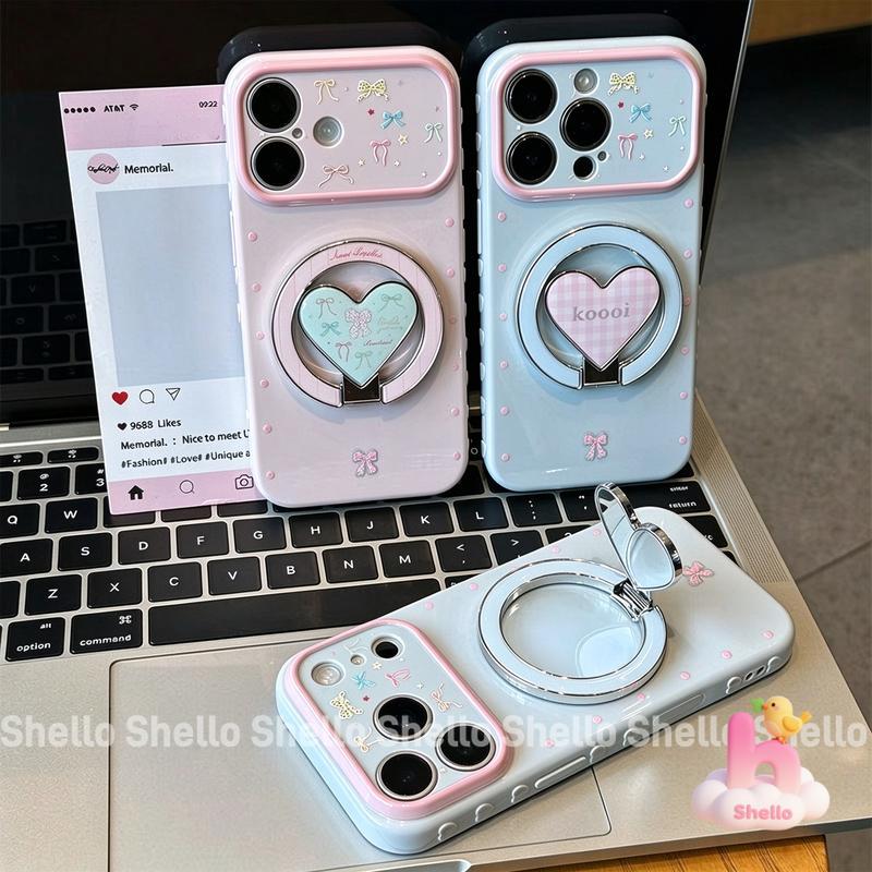 Ốp lưng iPhone 18 Pro Max,17 Pro Max,16 Pro Max,15 Pro Max,14,13,12,11,X,8,7 đế trái tim có gương trang điểm, in nơ xinh xắn, khung camera lớn chống rơi cho nữ
