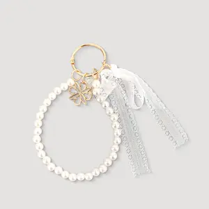 Les Catino Ribbon Tassel Accesoris Bag