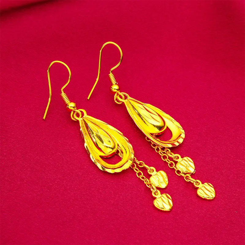 Stainless steel earrings as jewelry grade plated with 18K gold,embellished with a curved drop pendant and some Elegant gold fringed chain,is a fashion piece for women and girls.