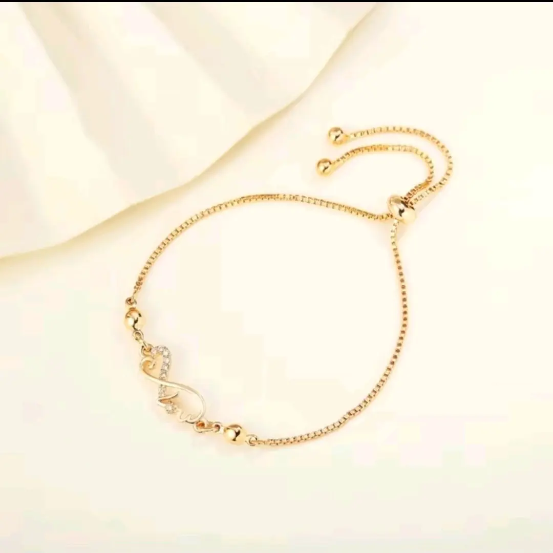 gelang serut wanita titanium motif infinite gold Bracelets
