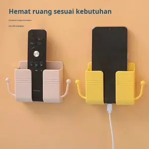 Kotak remote control yang digunakan untuk menaruh remote control pada dinding yang terpasang di remote control kamar mandi
