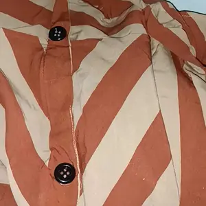 gamis salur kancing Wanita Muslim