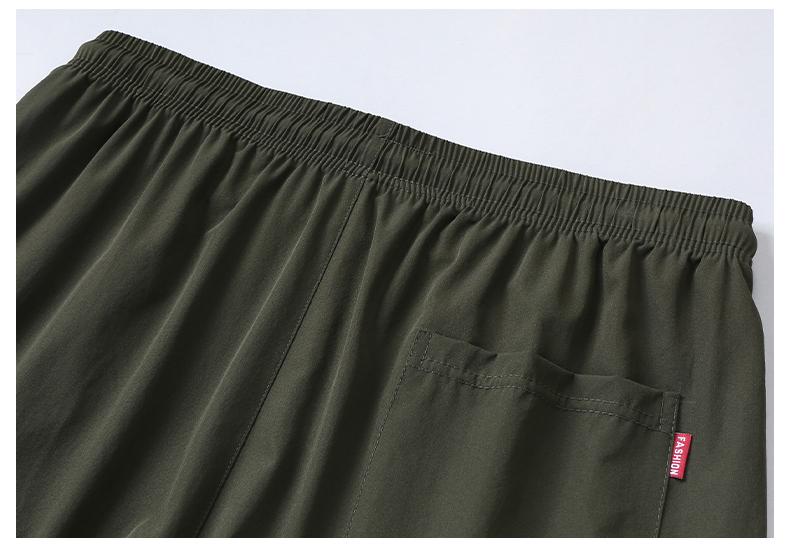 Product Introduction of M-8XL new nylon four-sided elastic summer men's casual sports nine-point pants ice silk small feet men's pants secondary development plus size 33