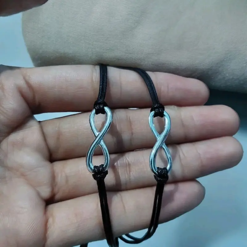 (isi2) Gelang Couple Infinity bracelet Premium - Gelang Pasangan Terbaru Model Simbol Cinta Abadi - Gelang Couple Pria Wanita Stainless Steel Anti Karat - Hadiah Romantis Pacar, Suami, Istri - Gelang  Tali  Hitam Elegan Aksesoris Trendy 3