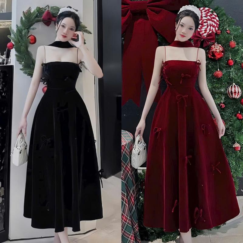  Đầm váy nữ nhung thiết kế 2 dây cổ yếm phối nơ dáng xòe dài sang chảnh dành cho các nàng diện đi chơi. 