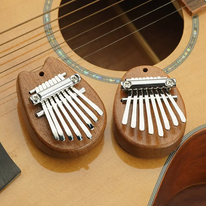 1pc, solid wood eight-tone thumb piano mini finger piano portable beginner finger piano musical instrument