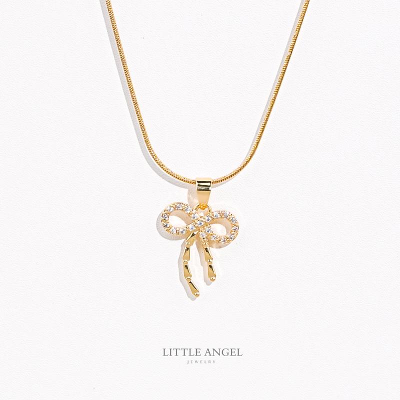 Product Introduction of Bow Pendant Necklace with Dancing Chain - RXD-136 Minimalist Stainless Steel Non Tarnish double platted Hypoallergenic 25
