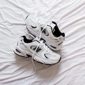 Sepatu Sneakers Pria Wanita White Black Running Shoes