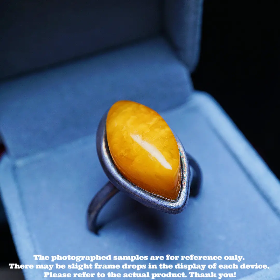 This is a ring made of natural raw ore amber and beeswax.