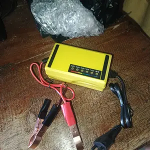 Charger Casan Aki Motor 12V Smart Otomatis 7-20Ah Sepeda Listrik Pengisi Daya Baterai Kering Basah Layar LCD Indikator Digital Capit Buaya Auto Cut Off Proteksi Overcharge Adaptor Cas Mobil Portable Kelistrikan Otomotif Mainan Anak Mobilan Kabel
