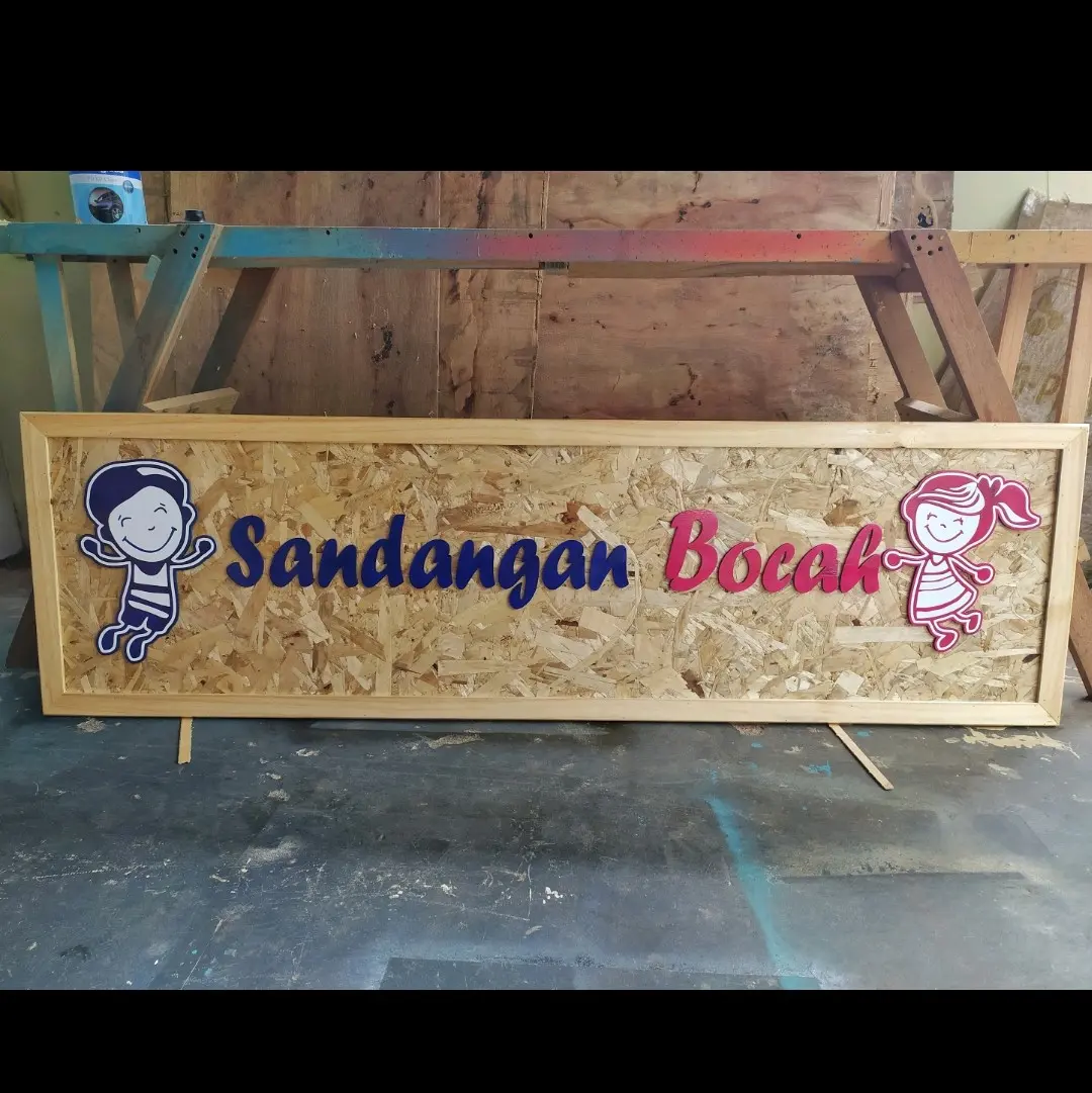custom tulisan/logo dengan cuting laser bahan kayu