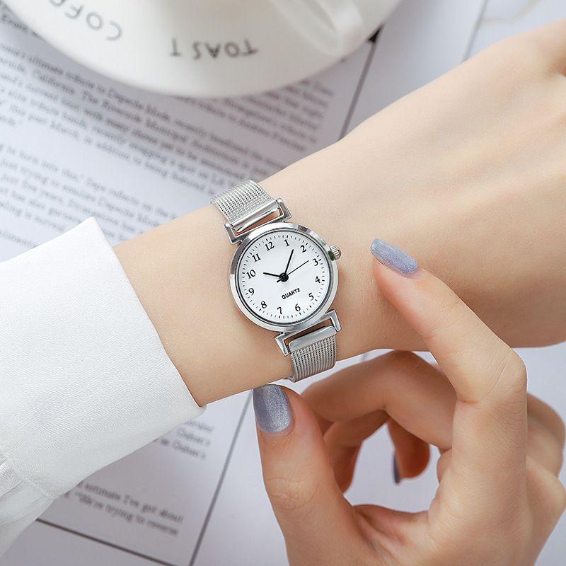Đồng hồ nữ thanh lịch chạy pin với dây đeo lưới thép không gỉ và núm xoắn ốc