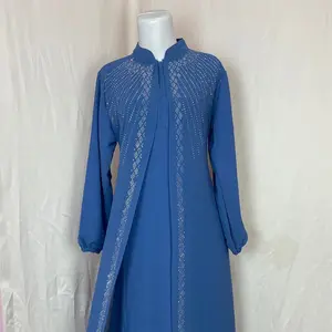 Abaya Ceruty Biru dengan Detail Jahitan Elegan dan Desain Modern untuk Tampilan Mewah