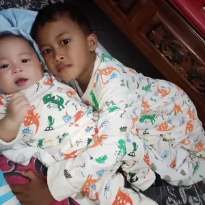 BAJU TIDUR ANAK DINOSAURUS FULL PRINT CREAM