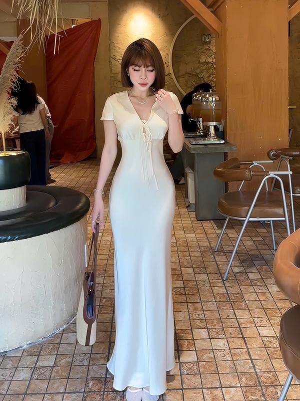 Đầm lụa cổ tim có tay thắt nơ ( 7207 ) chất lụa tô châu mềm mịn, form lài đuôi cá tôn dáng, có khóa kéo bên hông