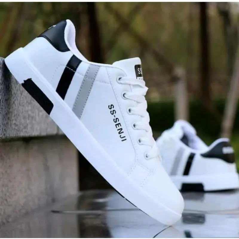 SEPATU Sneakers Putih & Hitam pria fashion casual ss.senji terlaris