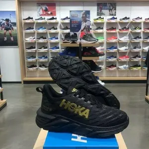 Hoka Sepatu Olahraga Johing Sneakers Sport Hitam Gold Unisex Trendy Size 35-44 Kualitas Terbaik