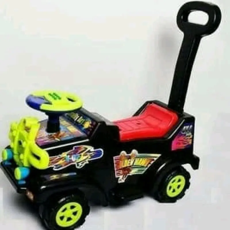 mobil yg bisa di dudukin pake dorongan pake musik pake batu batrei