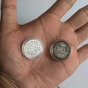 2 keping koin Perak 1 dirham
