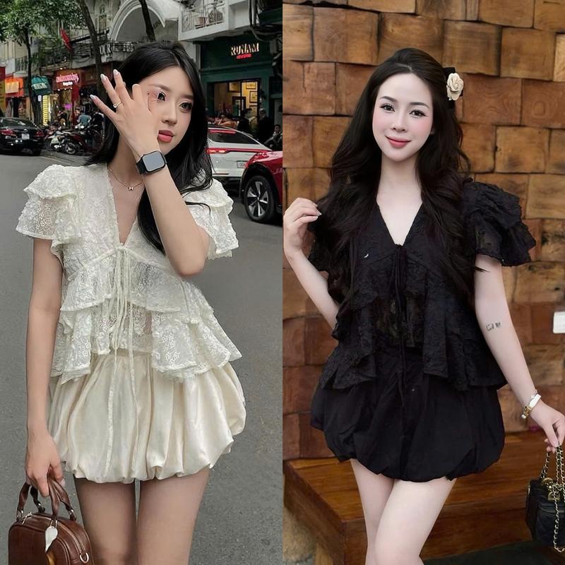Set đồ nữ áo ren cổ chữ V phối dây thoắt nơ tay cánh tiên xếp tầng kèm chân váy bí xinh xắn dành cho các nàng diện đi chơi, đi tiệc.