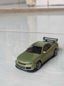 MINI GT 697 NISSAN SKYLINE GTR R34 R-Z MILLENIUM JADE - Shop | Tokopedia