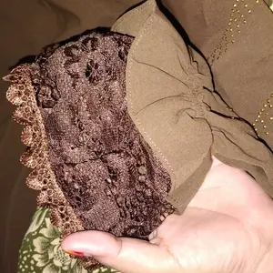 Nisyaa Abaya Renda Premium – Elegan Kancing Depan motif marmer