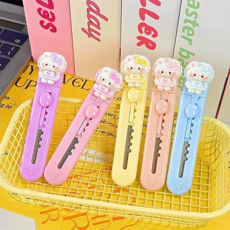 Dao dọc giấy gắn chảm mèo cute nhỏ gọn, tiện lợi