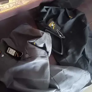 ALMUZANI Baju Koko Saku Depan Bawah Kerah Sanghai Bahan Toyobo Grade A