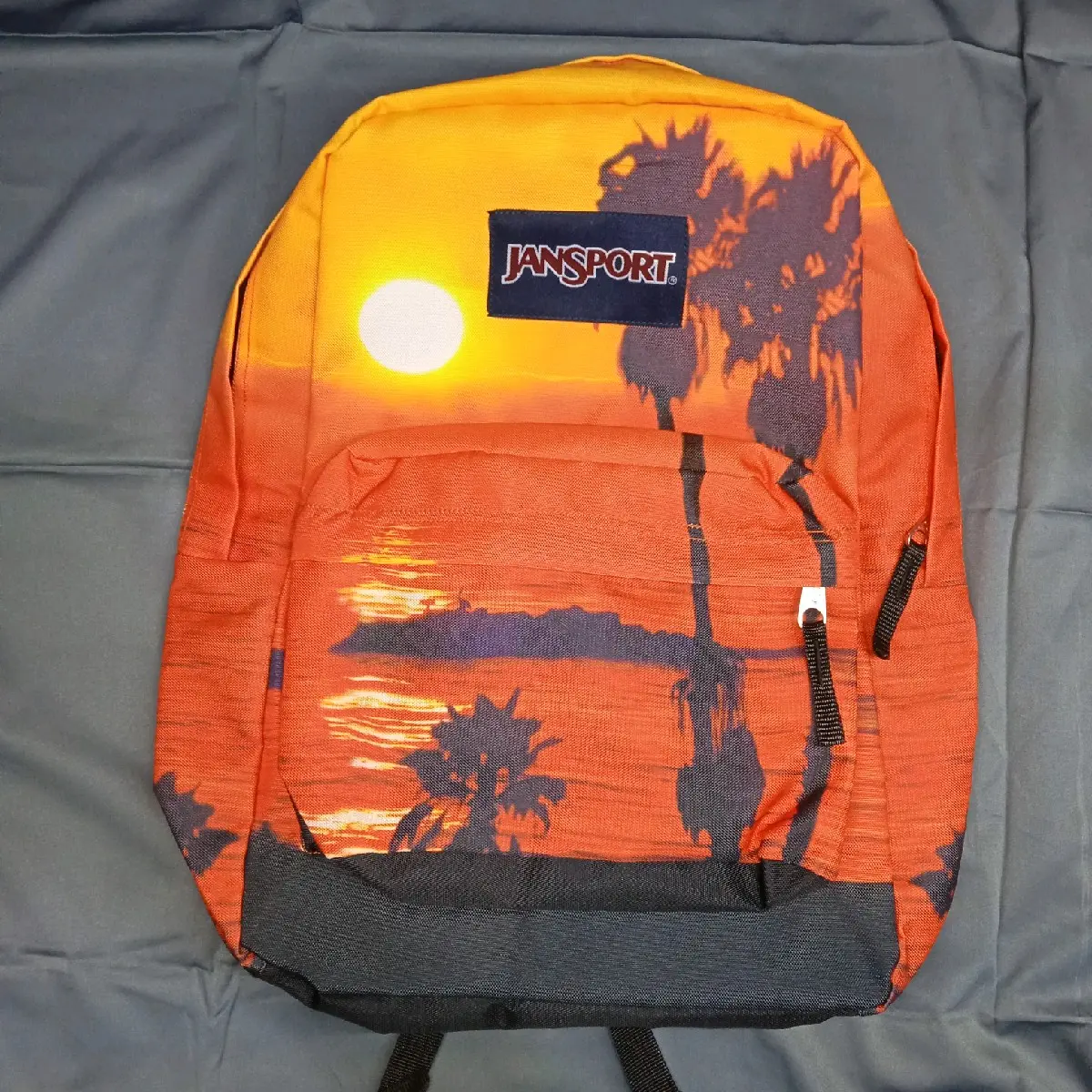 Jansport Motif Sunset full js full emboss(tag 5+hologram js+Barcode js bisa di scan+sletingjs)(ring tali js)super premium